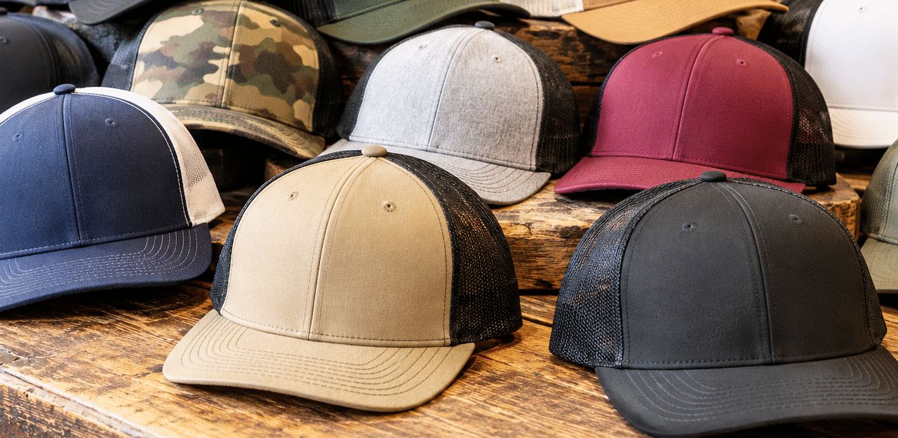 Richardson caps in many colors on a shop table
